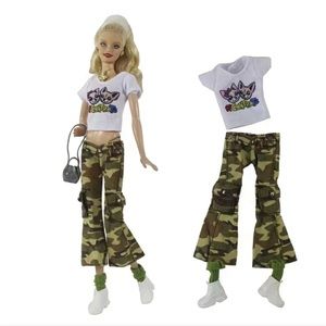 Barbie’s Street Style Camouflage pants, cropped top, sneakers, and bag.